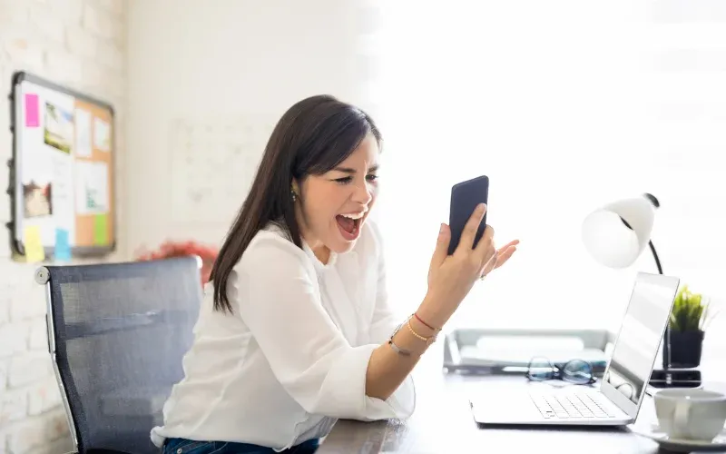 Person frustrated on social media.