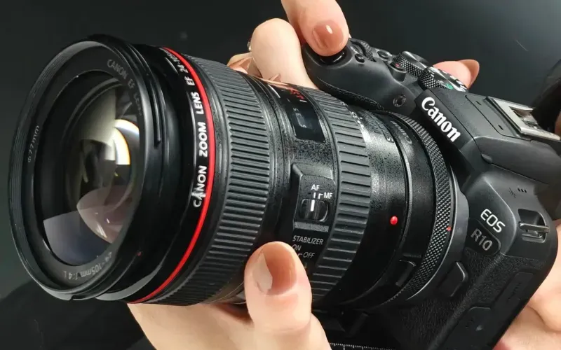 Taylor with a professional photography camera.