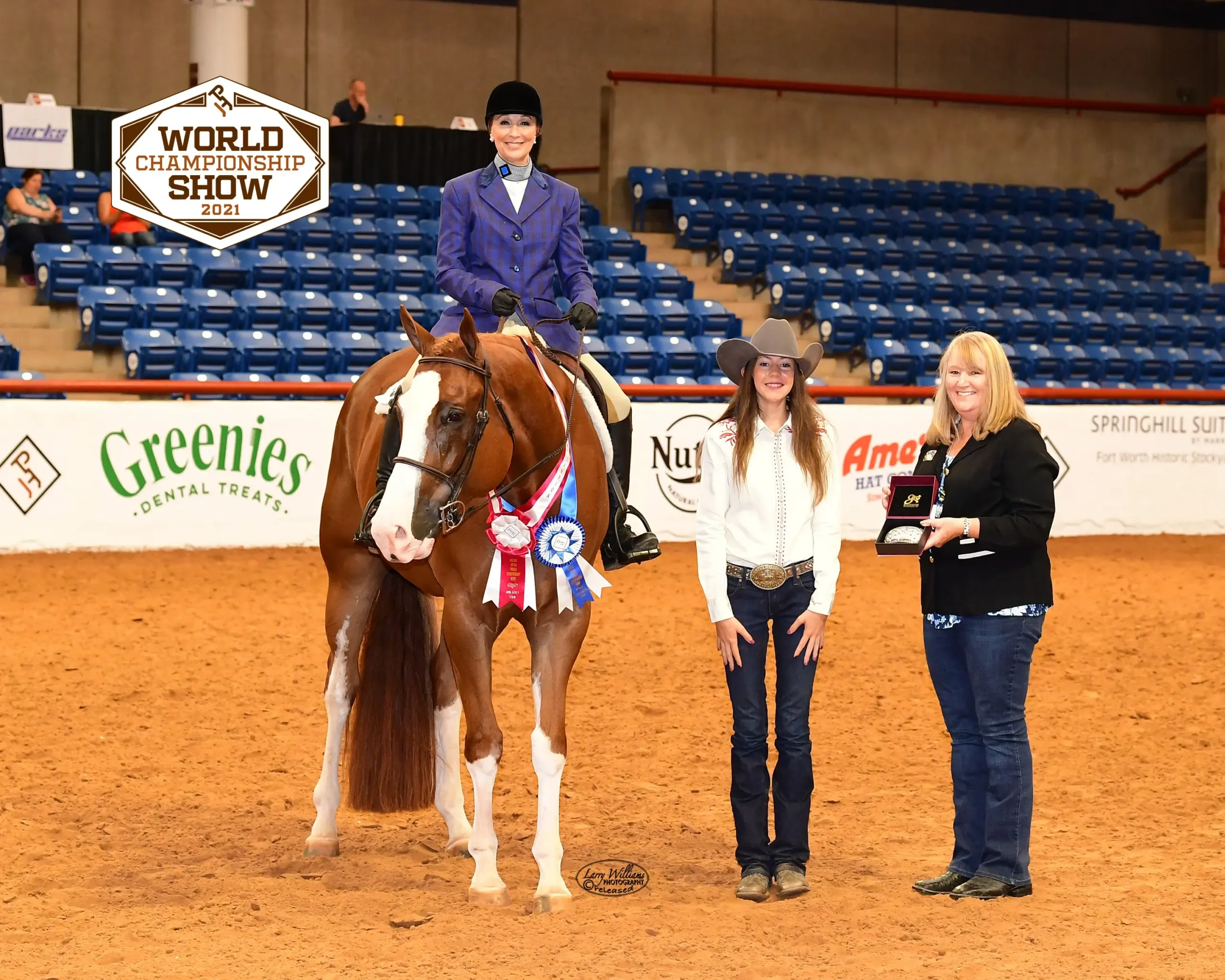 Amy winning an award with her horse.