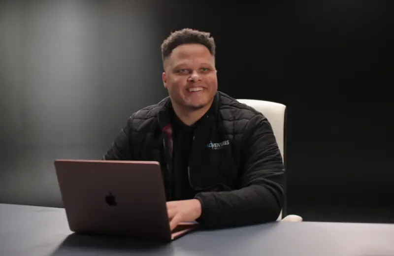 Malcolm on his computer.