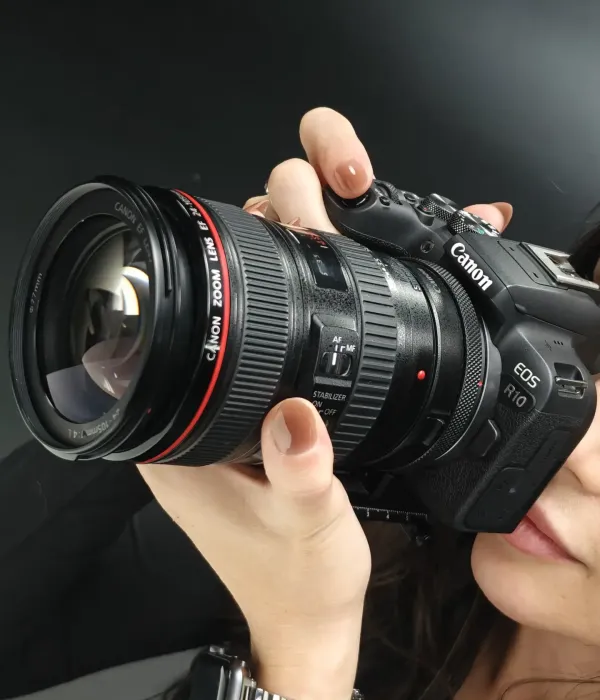 Taylor with a camera.